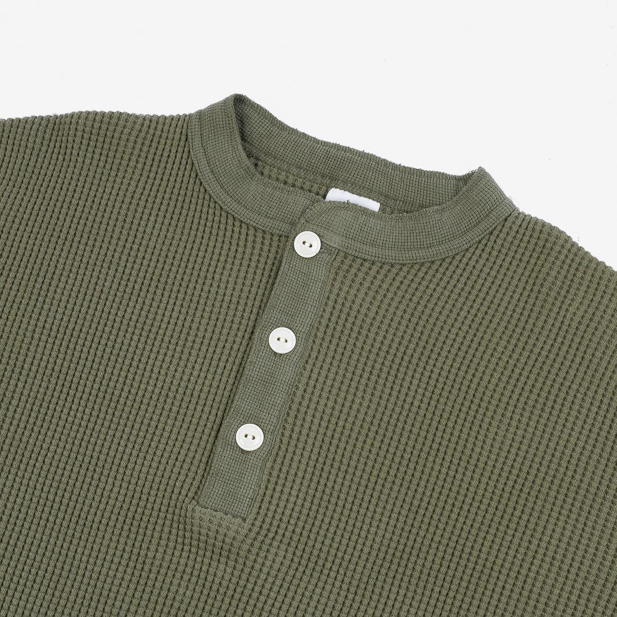 Image showing the IHTL-1213-OLV - Waffle Knit Long Sleeved Thermal Henley Olive which is a T-Shirts described by the following info Back In, Iron Heart, Released, T-Shirts, Tops and sold on the IRON HEART GERMANY online store