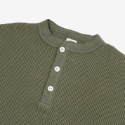 Image showing the IHTL-1213-OLV - Waffle Knit Long Sleeved Thermal Henley Olive which is a T-Shirts described by the following info Back In, Iron Heart, Released, T-Shirts, Tops and sold on the IRON HEART GERMANY online store