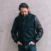 Image showing the DE-JA0002-BLK - Dehen 1920 Varsity Jacket Black which is a Jackets described by the following info Dehen 1920, Jackets, Released, Tops and sold on the IRON HEART GERMANY online store