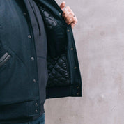 Image showing the DE-JA0002-BLK - Dehen 1920 Varsity Jacket Black which is a Jackets described by the following info Dehen 1920, Jackets, Released, Tops and sold on the IRON HEART GERMANY online store