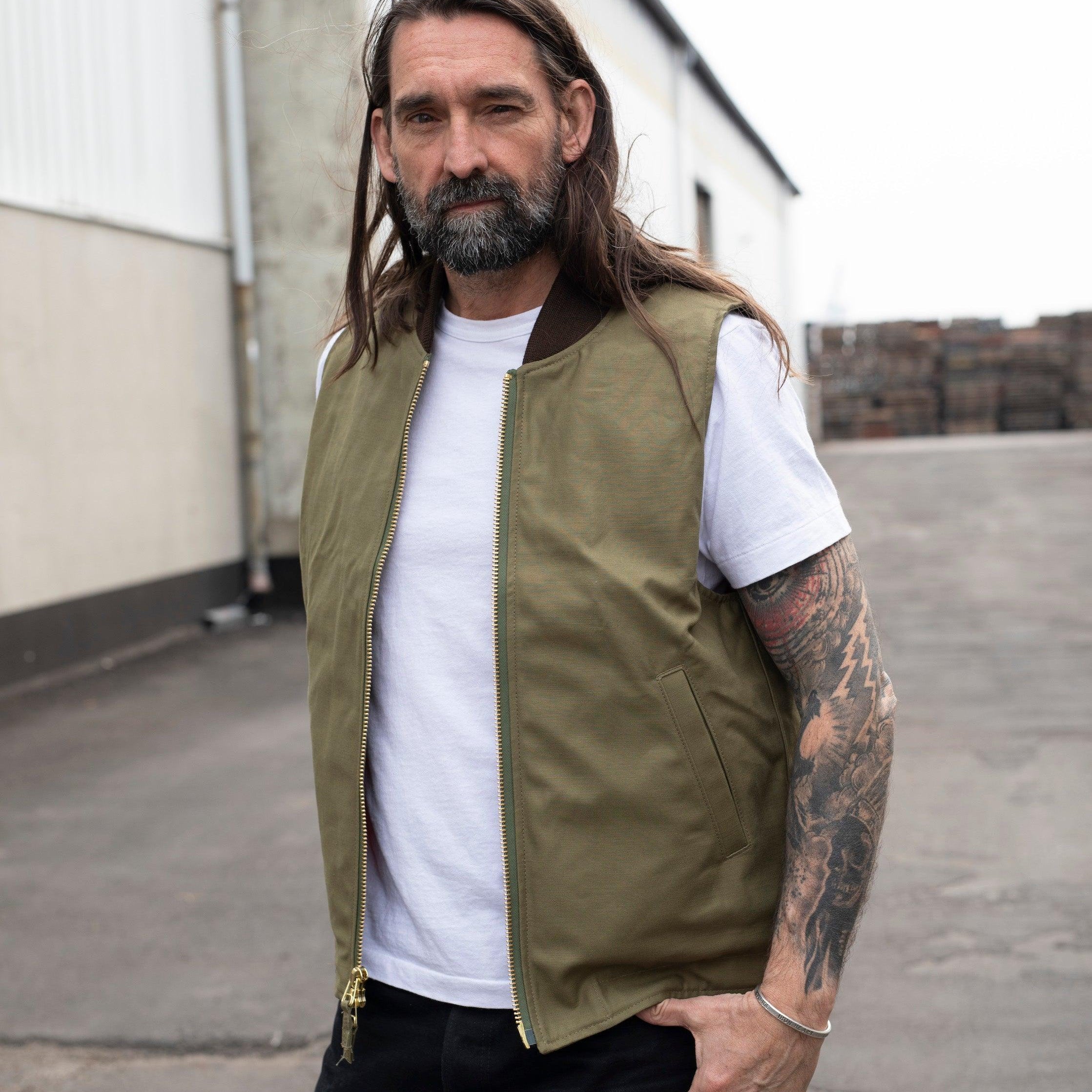 Image showing the DE-JV0093-OLV - Flight Vest Sateen - Olive which is a Vests described by the following info Dehen 1920, Released, Tops, Vests and sold on the IRON HEART GERMANY online store