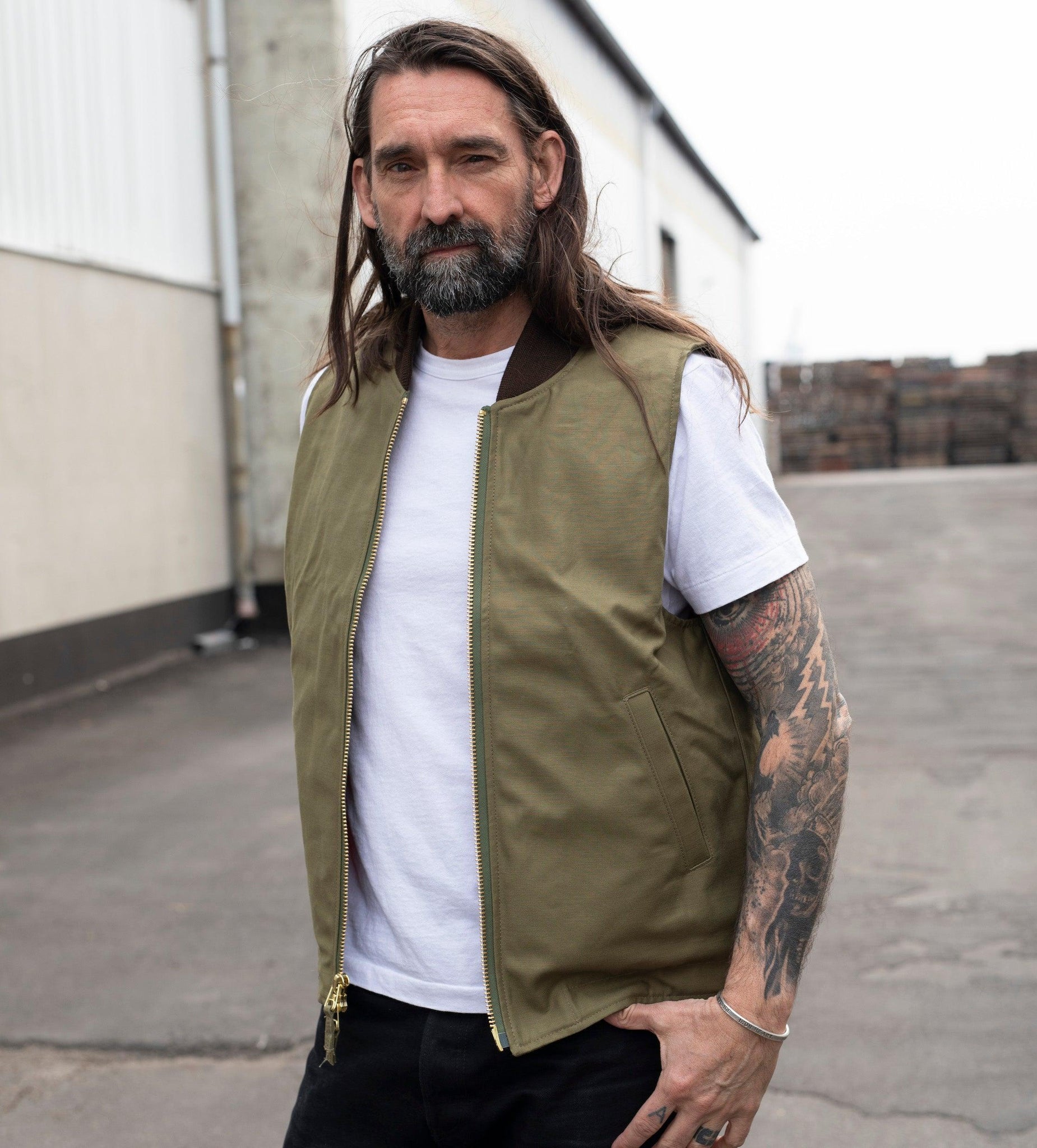 Image showing the DE-JV0093-OLV - Flight Vest Sateen - Olive which is a Vests described by the following info Dehen 1920, Released, Tops, Vests and sold on the IRON HEART GERMANY online store