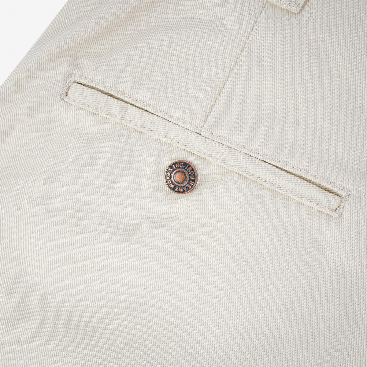 Image showing the IH-727-IVO - 9oz Mercerised Selvedge Cotton Medium/High Rise Tapered Chinos - Ivory which is a Trousers described by the following info Bottoms, Iron Heart, Released, Trousers and sold on the IRON HEART GERMANY online store