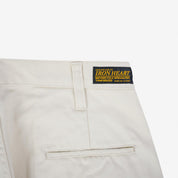 Image showing the IH-727-IVO - 9oz Mercerised Selvedge Cotton Medium/High Rise Tapered Chinos - Ivory which is a Trousers described by the following info Bottoms, Iron Heart, Released, Trousers and sold on the IRON HEART GERMANY online store