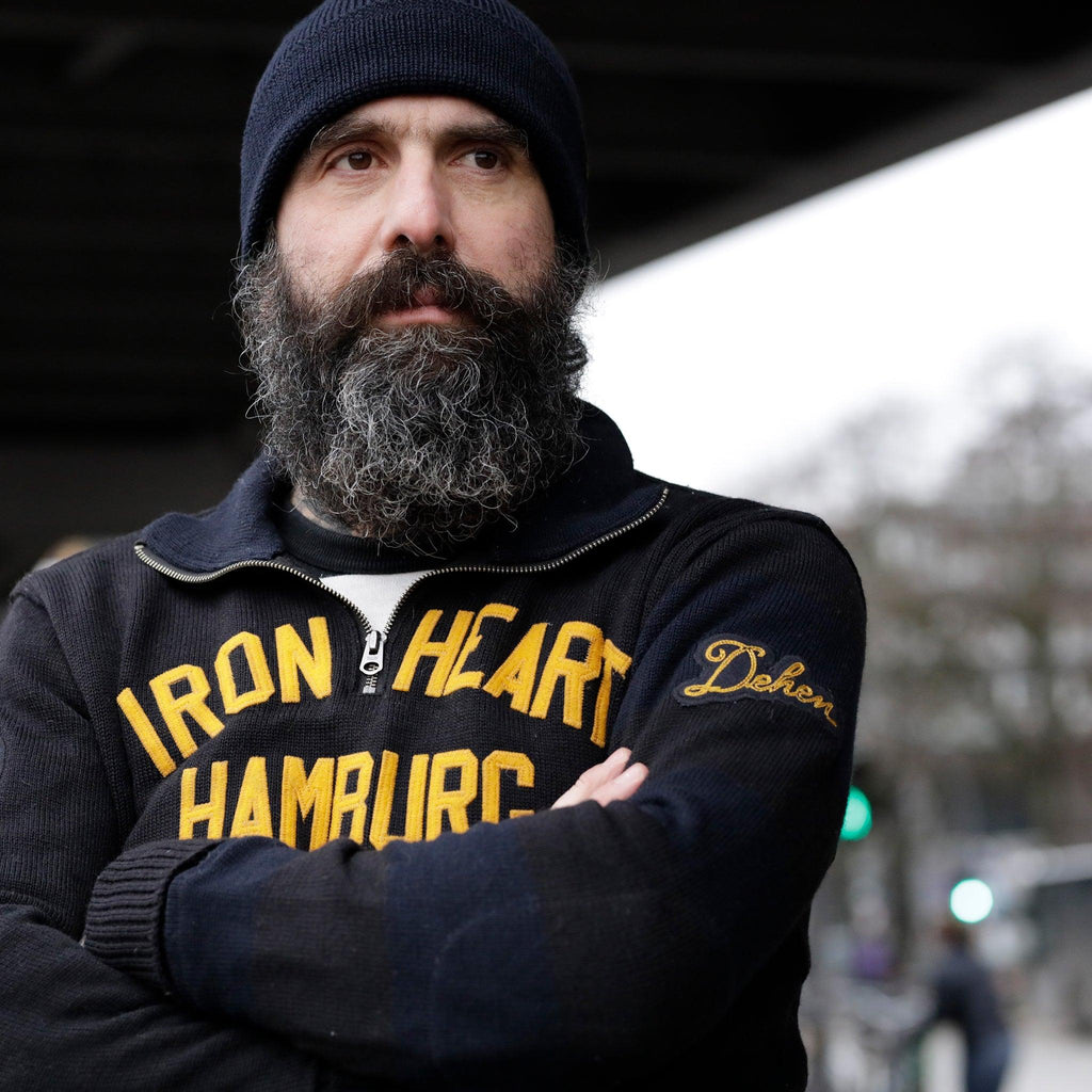 Image showing the DE-IHH-Custom-BLK - 1/4 Zip Moto-Jersey Hamburg - Black/ D.Navy which is a Knitwear described by the following info Dehen 1920, IHSALE_M23, Knitwear, Released, Tops and sold on the IRON HEART GERMANY online store