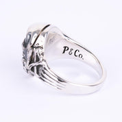 Image showing the Peanuts & Co SKULL POISON Ring - Silver/ Zirconia Black which is a Jewellery described by the following info Accessories, Jewellery, Peanuts & Co, Released and sold on the IRON HEART GERMANY online store