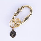 Image showing the Peanuts & Co PEANUTS CARABINER- Brass which is a Others described by the following info Accessories, Others, Peanuts & Co, Released and sold on the IRON HEART GERMANY online store