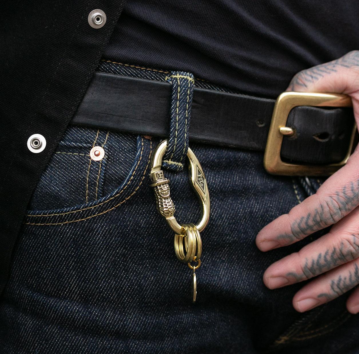 Image showing the Peanuts & Co PEANUTS CARABINER- Brass which is a Others described by the following info Accessories, Others, Peanuts & Co, Released and sold on the IRON HEART GERMANY online store