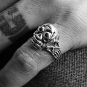 Image showing the Peanuts & Co SKULL POISON Ring - Silver/ Zirconia Black which is a Jewellery described by the following info Accessories, Jewellery, Peanuts & Co, Released and sold on the IRON HEART GERMANY online store