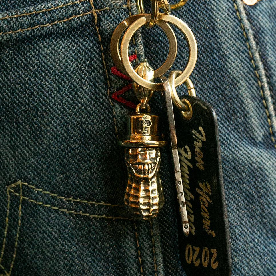Image showing the Peanuts & Co YACHIMATA PEANUTS key ring pendant - Brass which is a Others described by the following info Accessories, Others, Peanuts & Co, Released and sold on the IRON HEART GERMANY online store