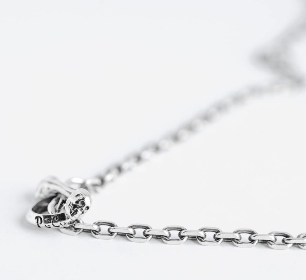 Image showing the Peanuts & Co SKULL HOOK CHAIN (square) - Silver which is a Jewellery described by the following info Accessories, Jewellery, Peanuts & Co, Released and sold on the IRON HEART GERMANY online store