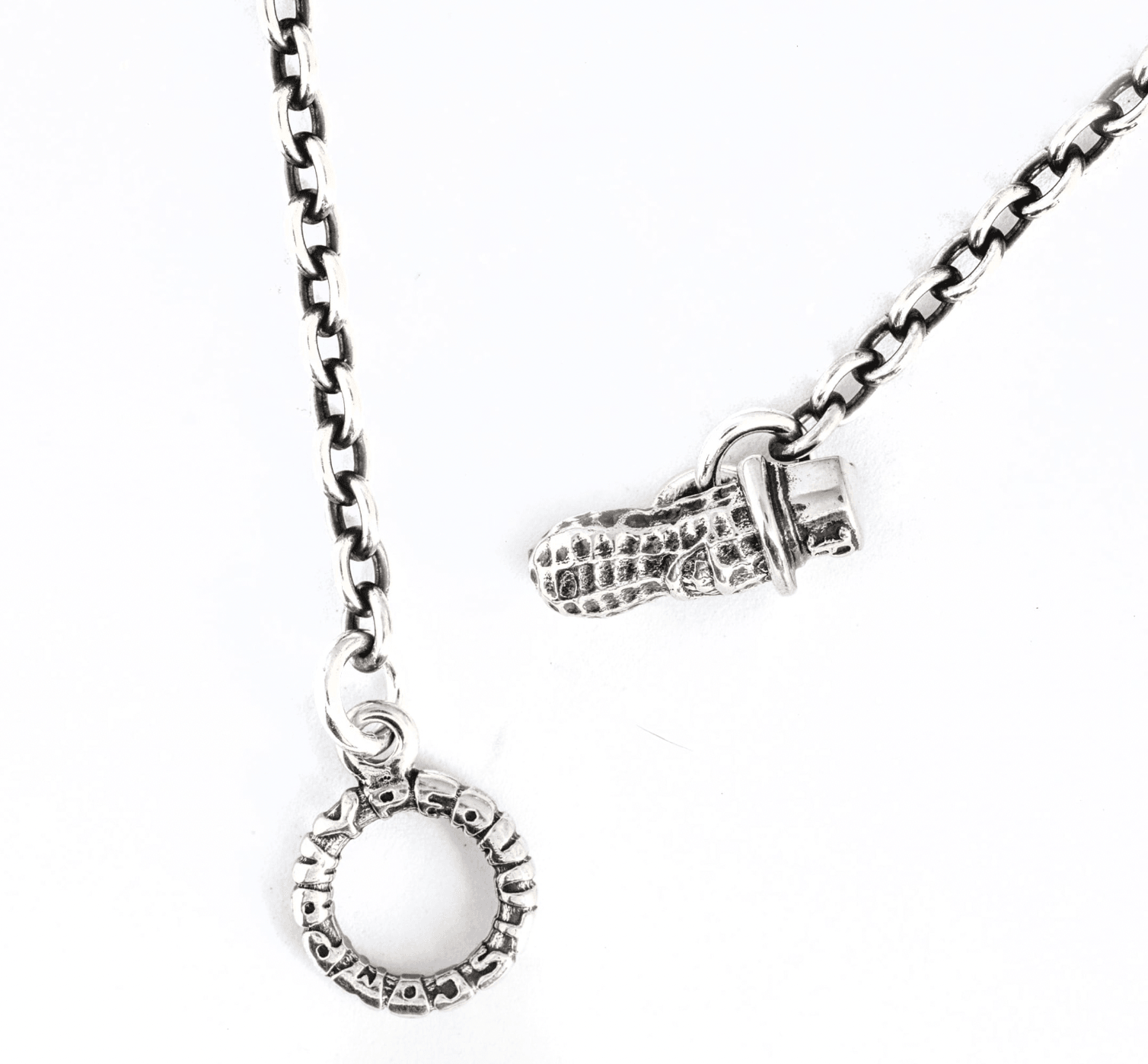Image showing the Peanuts & Co MEDIUM PEANUTS Pendant with silver chain - Silver which is a Jewellery described by the following info Accessories, Jewellery, Peanuts & Co, Released and sold on the IRON HEART GERMANY online store