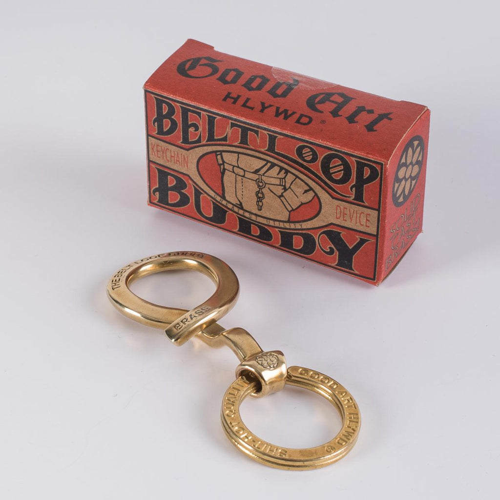 Image showing the GA-BLBB - GOOD ART HLYWD Belt Loop Buddy Brass which is a Others described by the following info Accessories, Back In, Iron Heart, Others, Released and sold on the IRON HEART GERMANY online store