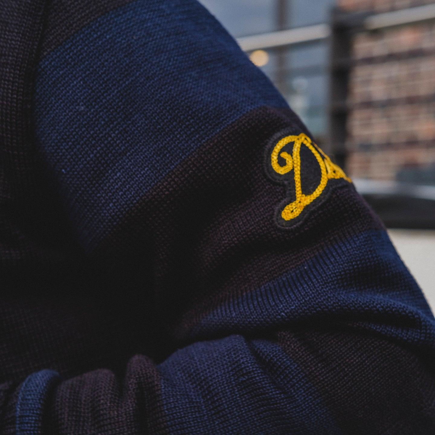 Image showing the DE-IHH-Custom-BLK - 1/4 Zip Moto-Jersey Hamburg - Black/ D.Navy which is a Knitwear described by the following info Dehen 1920, IHSALE_M23, Knitwear, Released, Tops and sold on the IRON HEART GERMANY online store
