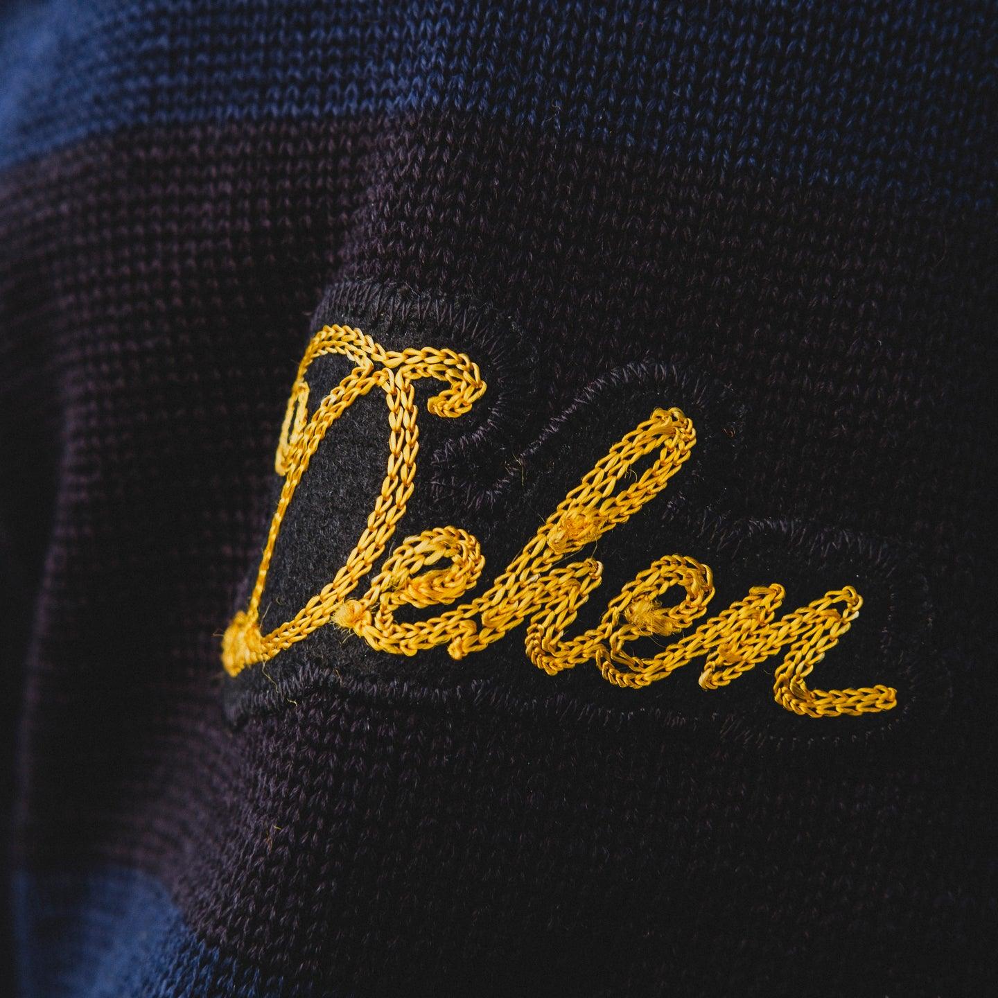 Image showing the DE-IHH-Custom-BLK - 1/4 Zip Moto-Jersey Hamburg - Black/ D.Navy which is a Knitwear described by the following info Dehen 1920, IHSALE_M23, Knitwear, Released, Tops and sold on the IRON HEART GERMANY online store