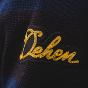 Image showing the DE-IHH-Custom-BLK - 1/4 Zip Moto-Jersey Hamburg - Black/ D.Navy which is a Knitwear described by the following info Dehen 1920, IHSALE_M23, Knitwear, Released, Tops and sold on the IRON HEART GERMANY online store